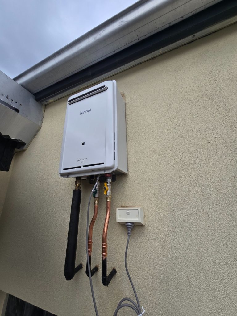 New Rinnai continuous flow hot water system installed by Right Now Plumbing Adelaide in Mitcham
